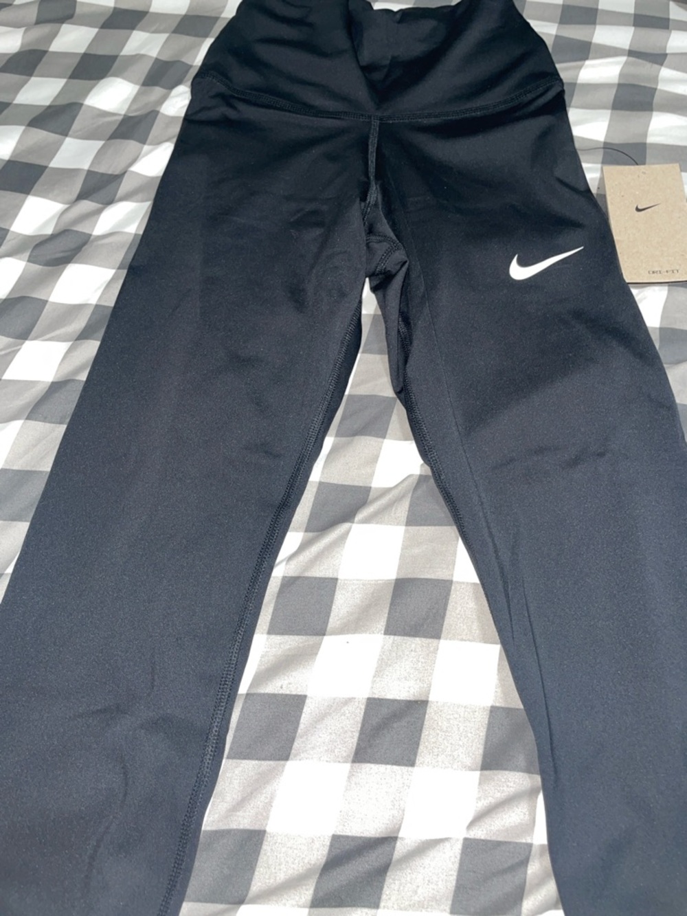 Nike Black Youth Performance Leggings with White Swoosh